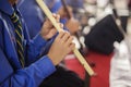 Young musicians playing flute on concert