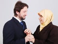 Young muslim couple looking at each other