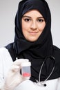 Young muslim doctor with medicines