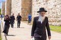 Young Muslim girl and old Jewish man in Jerusalem