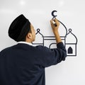 Young Muslim man drawing on a whiteboard Royalty Free Stock Photo