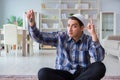 The young muslim man praying at home Royalty Free Stock Photo