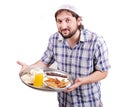 Young muslim man with prepared food