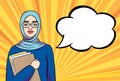 Young muslim student girl in hijab holding books and smiling with copy space for your text, hand drawn banner in pop art retro com Royalty Free Stock Photo