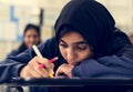 Young Muslim student studying at school Royalty Free Stock Photo