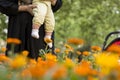 Young Muslim woman with her girl baby enjoying spring season day Royalty Free Stock Photo