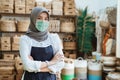 business of asian woman with head scarf and mask