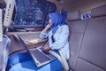 Woman sitting on backseat car while looking out Royalty Free Stock Photo