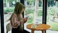 Young muslim woman take a picture cake with smartphone