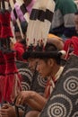 Young Naga boys wearing a hornbill feather headgear