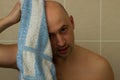 Young naked man wiping his head in towel Royalty Free Stock Photo