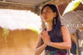 Young natural and attractive Asian Chinese woman practicing yoga and meditation exercise sitting lotus pose outdoors at beautiful Royalty Free Stock Photo