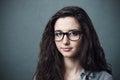 Young nerd woman with glasses