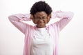 Young nervous brunette woman covering her ears with her hands, isolated on a white background Royalty Free Stock Photo