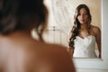 Young Nice Bride Looking in Mirror Royalty Free Stock Photo