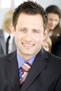 Young handsome succesful businessman smiling Royalty Free Stock Photo