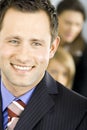 Young handsome succesful businessman smiling Royalty Free Stock Photo