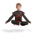 Young ninja meditating Royalty Free Stock Photo
