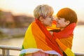 Portrait of a gender fluid couple wearing rainbow flag Royalty Free Stock Photo