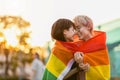 Portrait of a gender fluid couple wearing rainbow flag Royalty Free Stock Photo