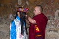 Bhutanese novice monk dress up for celebrate, Tamshing Goemba , Nyingma , Bumthang, central Bhutan. Royalty Free Stock Photo
