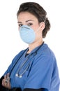 Young nurse, blue scrubs, mask, stethoscope Royalty Free Stock Photo