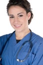 Young nurse, blue scrubs and stethoscope, isolated Royalty Free Stock Photo