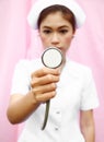 Young nurse with stethoscope