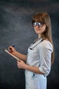 Young nurse wear medical uniform with stethoscope holding clipboard Royalty Free Stock Photo