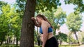 Young obese lady tired after jogging, daily cardio workouts to burn belly fat