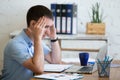 Young office man suffering from headache Royalty Free Stock Photo