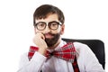 Young old fashioned man sitting by a desk. Royalty Free Stock Photo