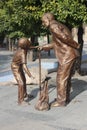 The young and old man bronze sculpture, contemporary street art, Shiraz, Iran
