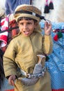 Young Omani boy dressed in traditional clothing. Royalty Free Stock Photo