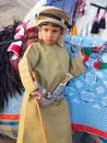 Young Omani boy dressed in traditional clothing. Royalty Free Stock Photo