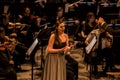 Young opera singer performing aria at National Theater in Belgrade