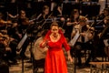 Young opera singer performing aria at National Theater in Belgrade
