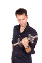 Young ordinary business man lifting dumbbells Royalty Free Stock Photo