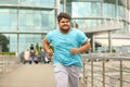 Young overweight man running. Fitness lifestyle