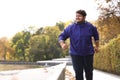 Young overweight man running. Fitness lifestyle