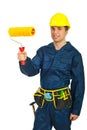 Young painter man holding paint roller Royalty Free Stock Photo