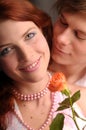 The young pair in love with rose Royalty Free Stock Photo