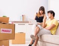 Young pair moving to new flat with fragile things