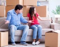 Young pair moving in to new house with boxes Royalty Free Stock Photo