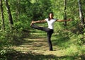 Girl exercising yoga - Parivrtta Hasta Padangusthasana