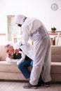 Young paramedic visiting old man at home Royalty Free Stock Photo