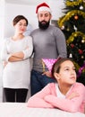 Parents lecturing daughter at Christmas Royalty Free Stock Photo