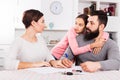 Parents signing papers for divorce Royalty Free Stock Photo