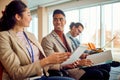 Young participants are chatting during a business lecture in the conference room. Business, people, company Royalty Free Stock Photo