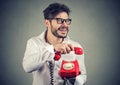 Crazy man hanging up phone Royalty Free Stock Photo